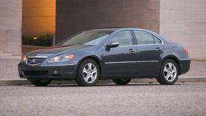 Превью обои acura, rl, 2004, синий, вид сбоку, стиль, акура, авто, здание, асфальт