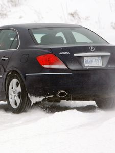 Превью обои acura, rl, черный, вид сзади, акура, авто, снег, стиль, движение