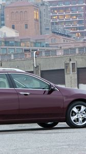 Превью обои acura, tsx, 2010, вишневый, вид сбоку, стиль, авто, акура, город, здания, мост, асфальт