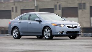 Превью обои acura, tsx, 2010, голубой, вид сбоку, стиль, авто, акура, здание, скорость, асфальт