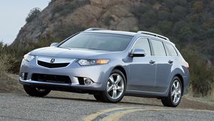 Превью обои acura, tsx, 2010, голубой, вид спереди, стиль, авто, акура, кустарники, скала, небо, асфальт