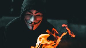 Превью обои аноним, маска, книга, огонь