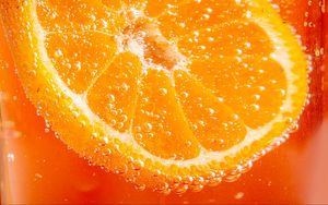 Превью обои апельсин, долька, пузыри, макро