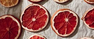 Превью обои апельсин, грейпфрут, дольки, сухой, цитрус