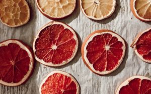 Превью обои апельсин, грейпфрут, дольки, сухой, цитрус