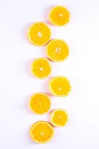 Превью обои апельсины, цитрусы, слайсы, белый фон