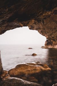 Превью обои арка, пещера, камни, скалы, море