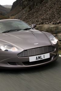 Превью обои астон мартин, 2004, серый, вид спереди, стиль, авто, aston martin, db9, скорость, горы, асфальт