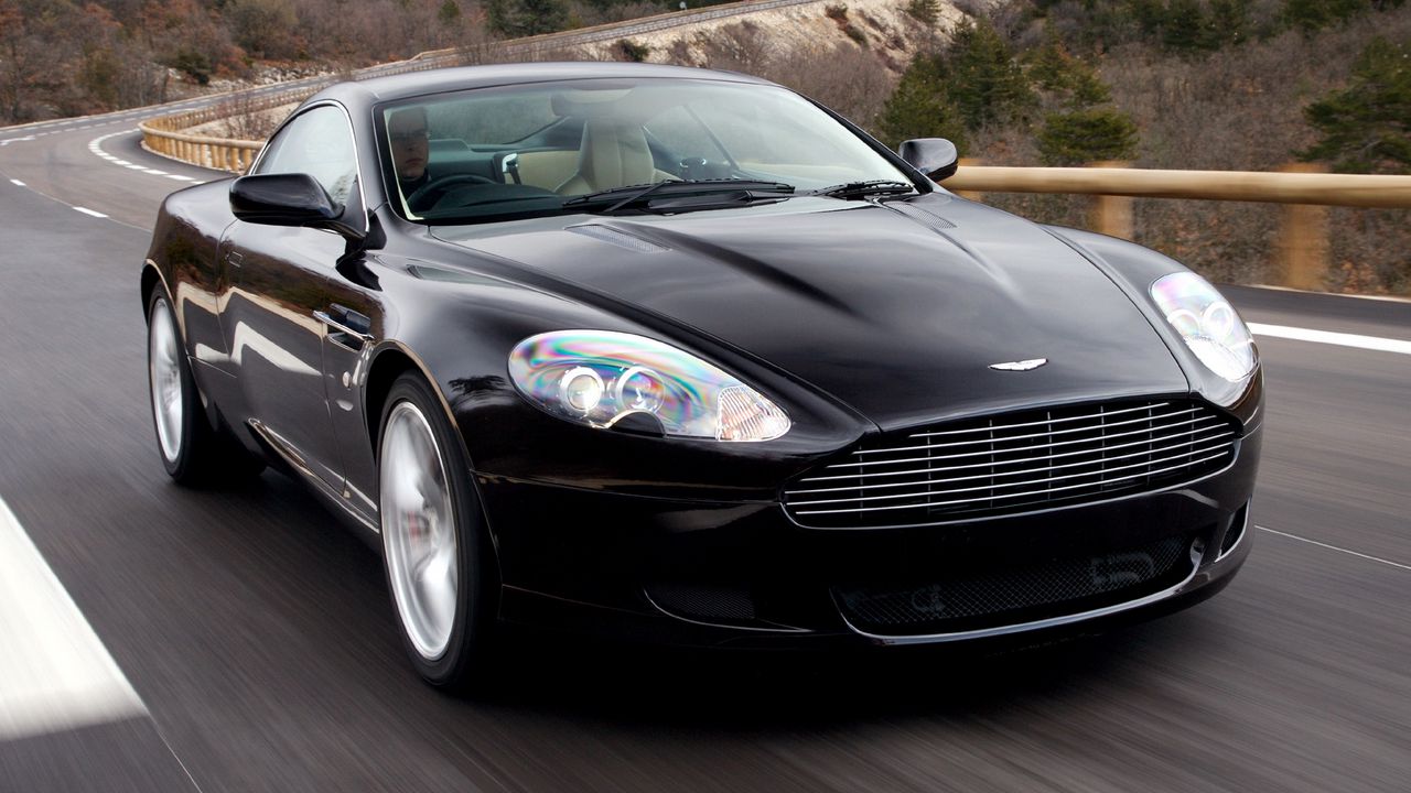 Обои астон мартин, 2006, черный, вид спереди, стиль, авто, aston martin, db9, спорт, скорость, природа, деревья, асфальт