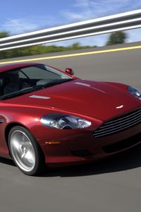 Превью обои астон мартин, 2008, красный, вид сбоку, стиль, aston martin, db9, авто, скорость, деревья, асфальт