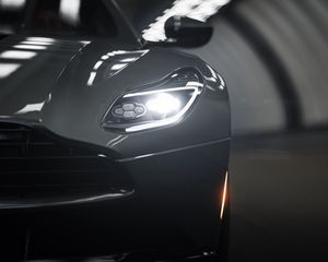 Превью обои aston martin db11, aston martin, спорткар, серый, фара, вид спереди, крупный план