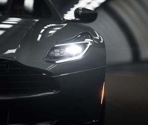 Превью обои aston martin db11, aston martin, спорткар, серый, фара, вид спереди, крупный план