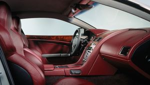 Превью обои aston martin, db9, 2004, красный, салон, интерьер, руль