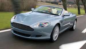 Превью обои aston martin, db9, 2004, голубой, вид спереди, авто, астон мартин, скорость, деревья, природа