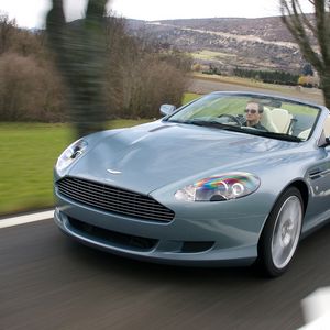 Превью обои aston martin, db9, 2004, голубой, вид спереди, авто, астон мартин, скорость, деревья, природа