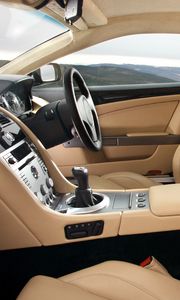 Превью обои aston martin, db9, 2006, бежевый, интерьер, салон, руль, спидометр