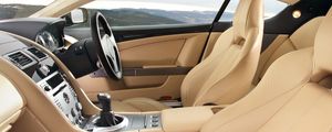 Превью обои aston martin, db9, 2006, бежевый, интерьер, салон, руль, спидометр