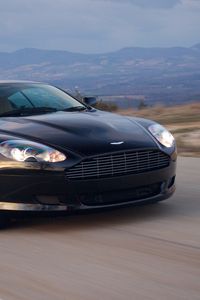 Превью обои aston martin, db9, 2006, синий, вид спереди, стиль, спорт, астон мартин, авто, природа, горы, асфальт, скорость