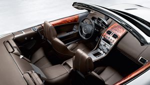 Превью обои aston martin, db9, 2008, коричневый, вид сверху, салон, интерьер, руль, спидометр