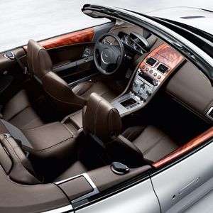 Превью обои aston martin, db9, 2008, коричневый, вид сверху, салон, интерьер, руль, спидометр