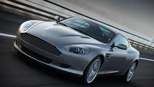 Превью обои aston martin, db9, 2008, серый, вид спереди, стиль, спорт, астон мартин, авто, скорость, асфальт