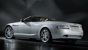 Превью обои aston martin, db9, 2010, белый, вид сбоку, стиль, астон мартин, авто, отражение