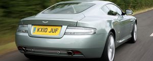 Превью обои aston martin, db9, 2010, бледно-синий, вид сзади, стиль, скорость, природа