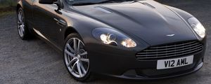 Превью обои aston martin, db9, 2010, черный, вид спереди, стиль, авто, астон мартин, горы