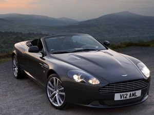 Превью обои aston martin, db9, 2010, черный, вид спереди, стиль, авто, астон мартин, горы