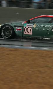 Превью обои aston martin, dbr9, 2005, зеленый, вид сбоку, стиль, спорт, астон мартин, авто, скорость, мокрый асфальт