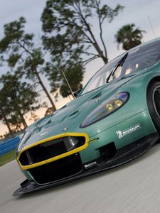 Превью обои aston martin, dbr9, 2005, зеленый, вид спереди, стиль, авто, спорт, астон мартин, природа, деревья, асфальт