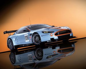 Превью обои aston martin, dbr9, 2008, белый, вид сбоку, стиль, спорт, астон мартин, авто, отражение