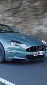 Превью обои aston martin, dbs, 2008, зеленый, вид сбоку, скала, астон мартин, авто