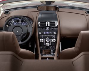 Превью обои aston martin, dbs, 2009, коричневый, интерьер, салон, руль, спидометр, стиль