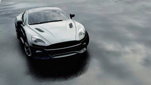 Превью обои aston martin dbs v12, aston martin, черный, вид спереди