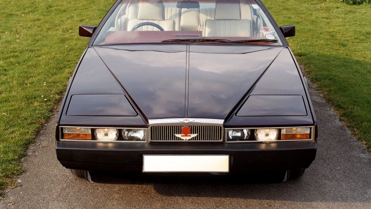 Обои aston martin, lagonda, 1976, синий, вид спереди, трава, астон мартин