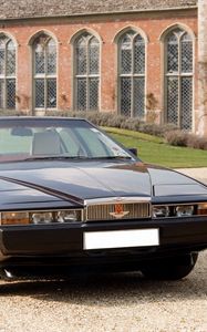 Превью обои aston martin, lagonda, 1976, вишневый, вид спереди, стиль, астон мартин, здание