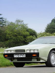 Превью обои aston martin, lagonda, 1987, зеленый, вид спереди, ретро, астон мартин, деревья