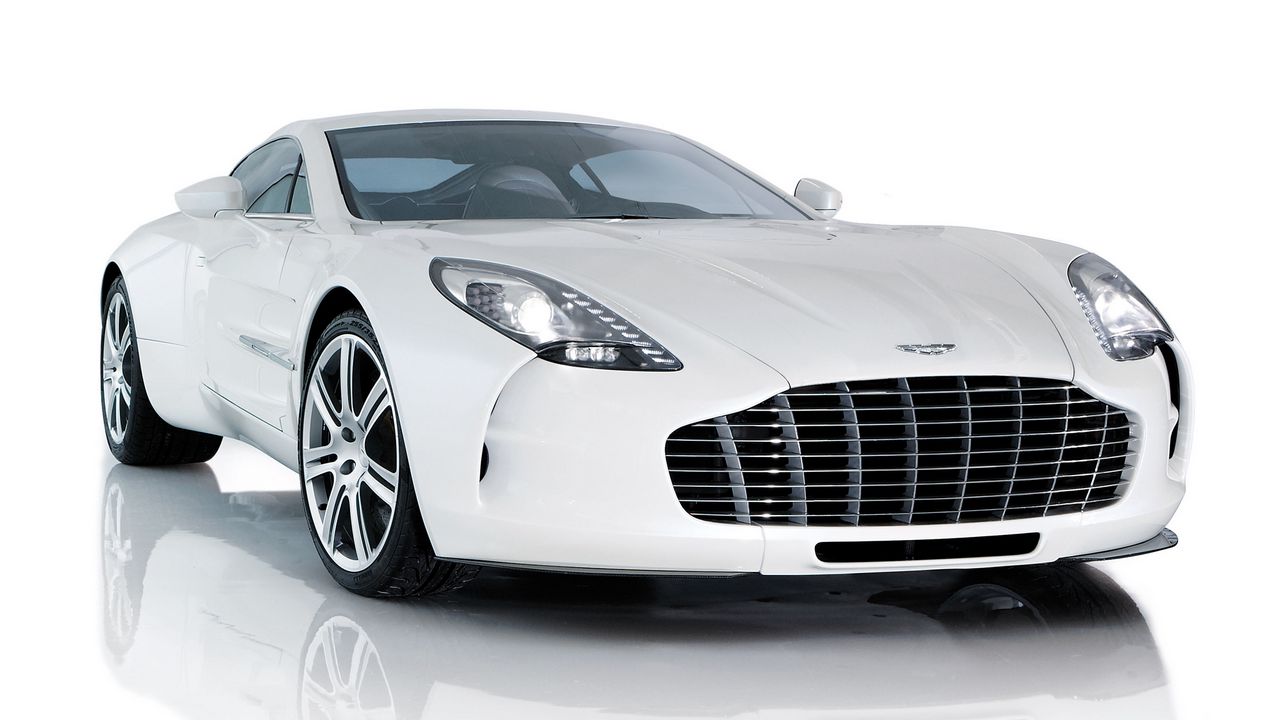 Обои aston martin, one-77, 2009, белый, вид спереди, стиль, астон мартин, отражение