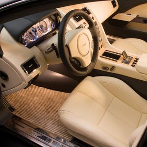 Превью обои aston martin, rapide, 2006, концепт кар, бежевый, салон, интерьер, руль, спидометр