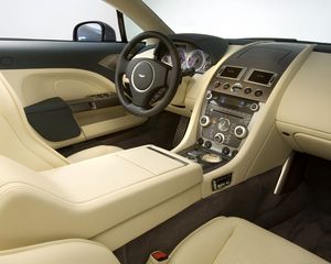 Превью обои aston martin, rapide, 2009, салон, интерьер, руль, спидометр