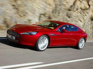 Превью обои aston martin, rapide, 2009, красный, вид сбоку, астон мартин, скорость, асфальт