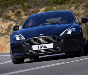 Превью обои aston martin, rapide, 2009, черный, вид спереди, стиль, астон мартин, асфальт