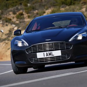 Превью обои aston martin, rapide, 2009, черный, вид спереди, стиль, астон мартин, асфальт