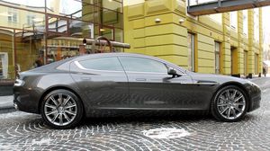 Превью обои aston martin, rapide, 2011, серый, вид сбоку, астон мартин, здание