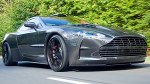 Превью обои aston martin, серый, дорога, передний бампер