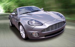 Превью обои aston martin, v12, vanquish, 2001, сиреневый, вид спереди, авто, астон мартин, скорость