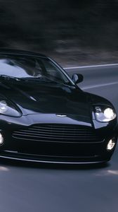 Превью обои aston martin, v12, vanquish, 2004, черный, вид спереди, астон мартин, асфальт