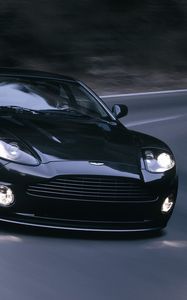 Превью обои aston martin, v12, vanquish, 2004, черный, вид спереди, астон мартин, асфальт