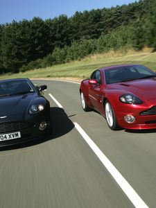 Превью обои aston martin, v12, vanquish, 2004, черный, красный, вид спереди, авто, астон мартин, скорость